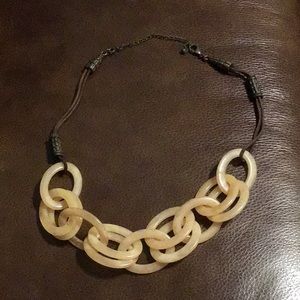 EUC,necklace,resin and leather,resembles bone. 18” with 3” extender